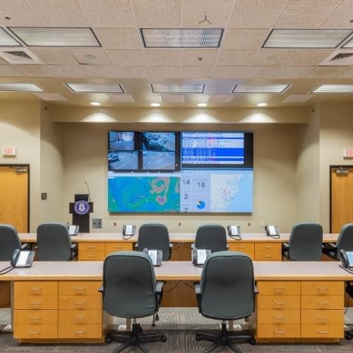 Modern boardroom with video conferencing system. 8